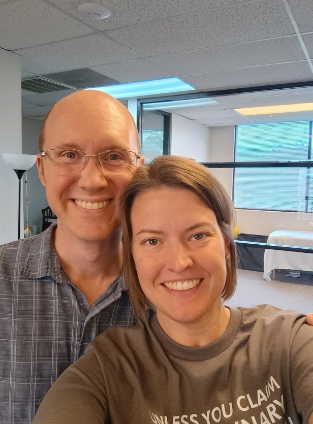 Jason and his wife Jenna taking a selfie indoors